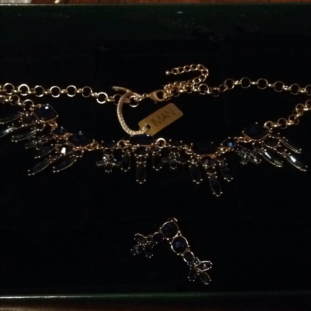 Gold tone Iman Necklace with blue stones